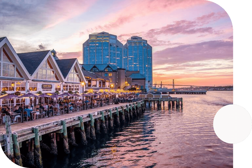 Restaurants-with-patios-overlooking-the-Bedford-Basin-near-downtown-Halifax-Nova-Scotia-at-sunset